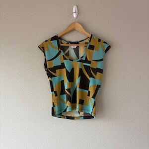 bebe y2k geometric cap sleeve top